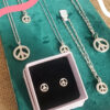 mooki jewellery peace studs recycled silver dainty