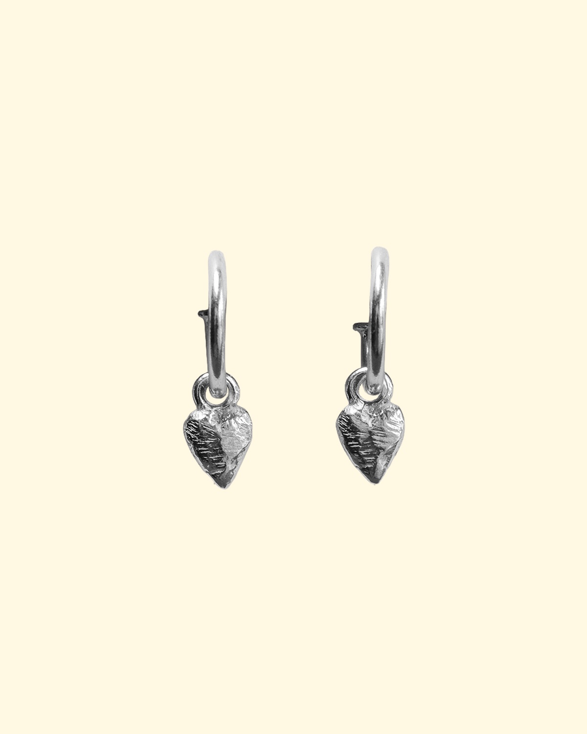 cherish hoops silver tiny heart charm earrings mooki jewellery