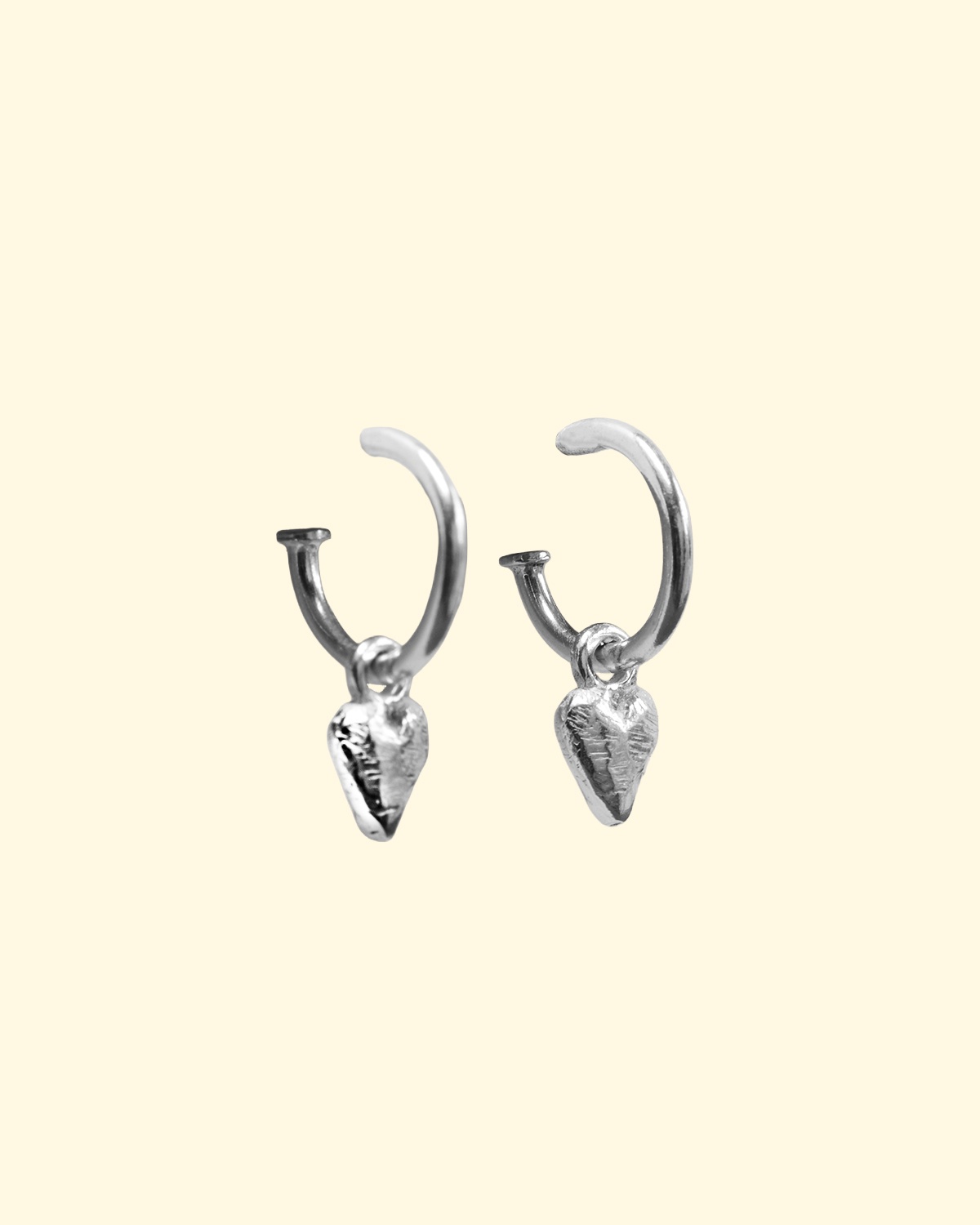 cherish hoops silver tiny heart charm earrings mooki jewellery